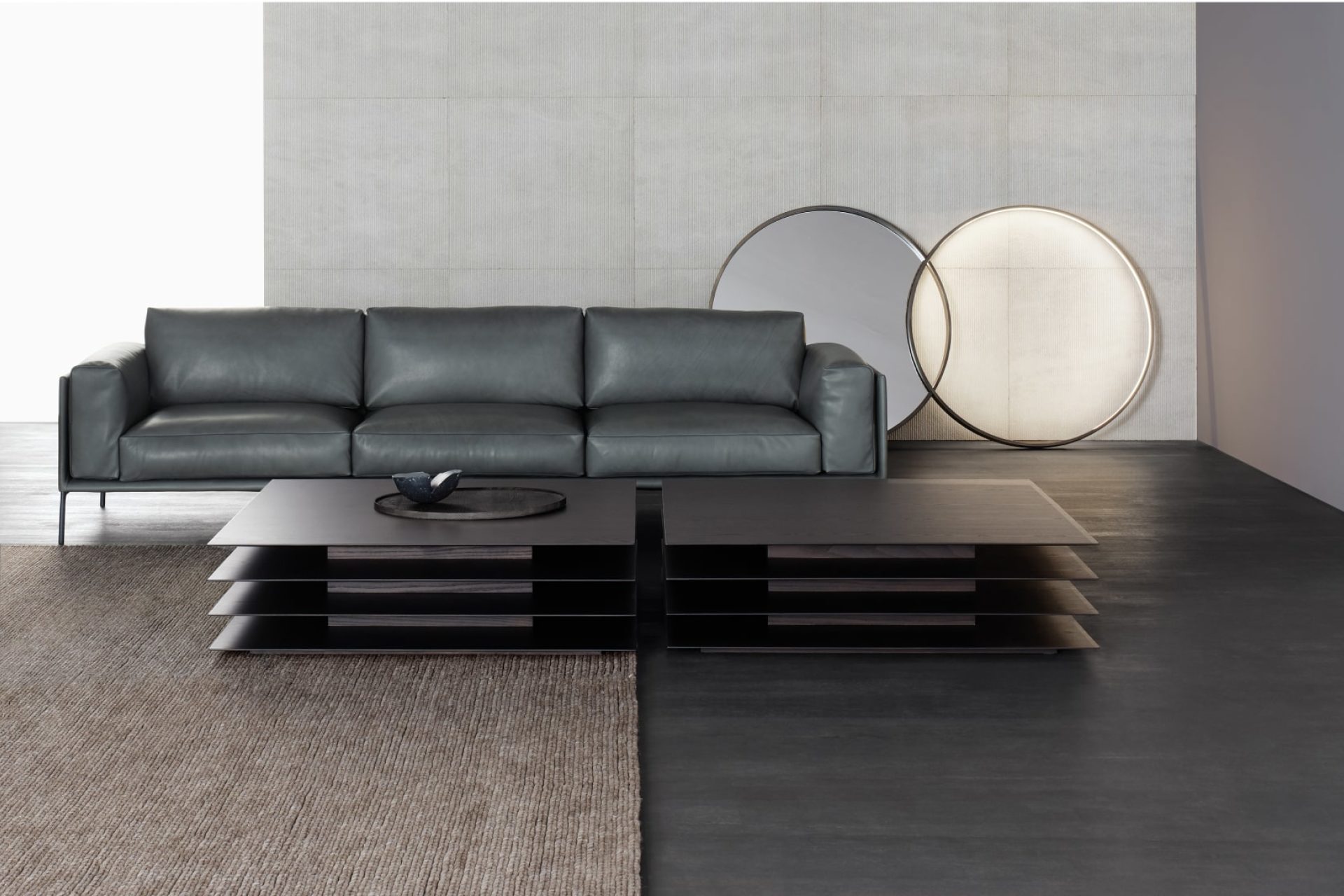Three-seater grey leather sofa with a birch wood frame