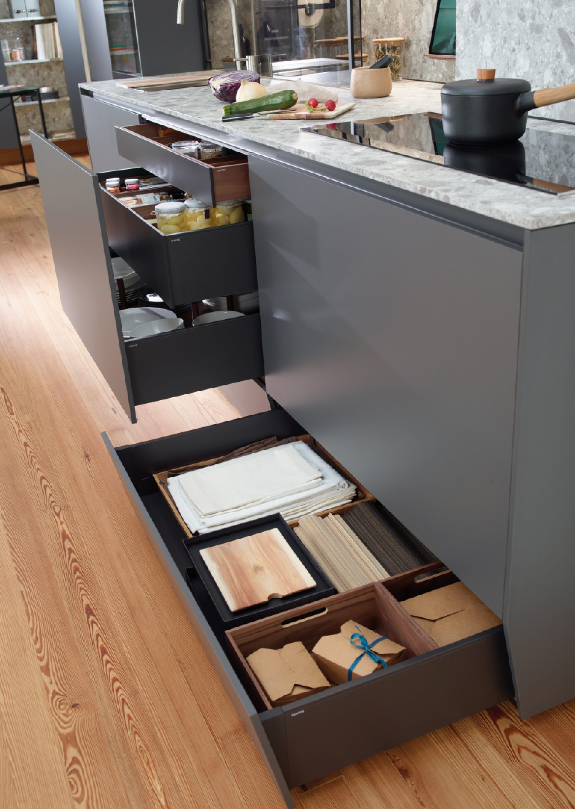 Image of kitchen plinth drawers with practical storage space
