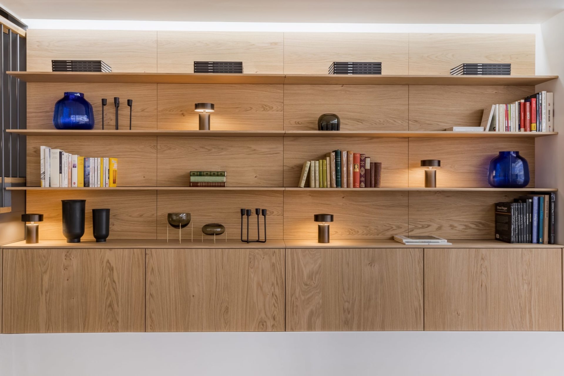 Sideboard shelves with an oak wood-effect finish, including drawer modules at the bottom of the piece