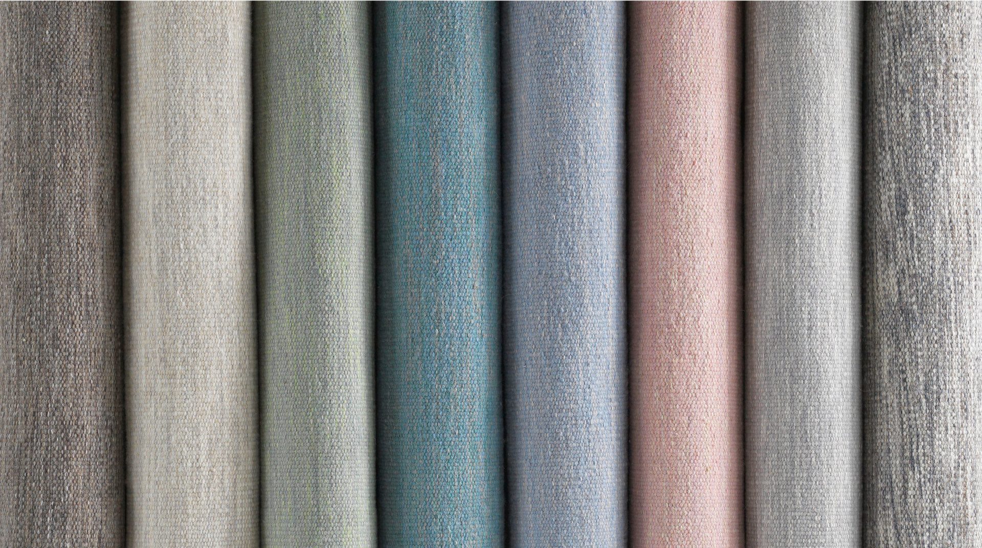 Échantillons de toiles de tapis dans différents tons